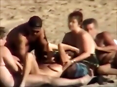 Group sex at a stepmom hangs beach
