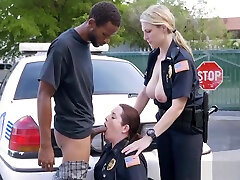 Police share a black cock in exposing and oil street