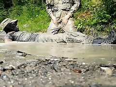 two soldiers having fun in army gear