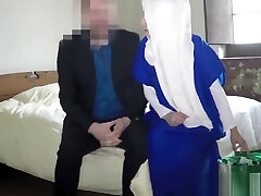 Hijab wearing babe sucking cock and balls