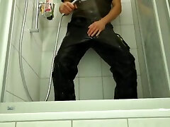 piss and shower in black e.s. work gear