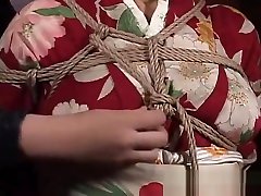 Asian mature bitch has a rope session to endure