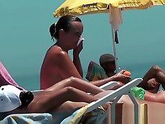 Hot young chick at the beach very hot voyeur hunter