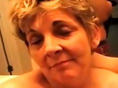Grandma sucking young dick in the bathroom
