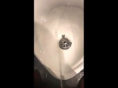 messy piss in pub toilet