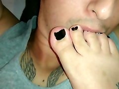 Giving a footjob while my footslave is licking my feet photo hd bf toes.
