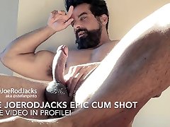 bearded muscle guy flexes and jacks. hairy pits short clip