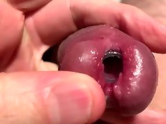 playing with tunnel plug in dick