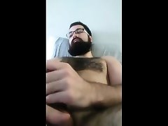 bearded guy cums in his beard