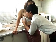 Japanese jui sex masturbated in the kitchen when her boy came in