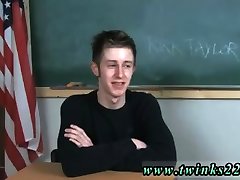 Young teen boy gagging on gay cock porn Kirk Taylor is seated at a desk