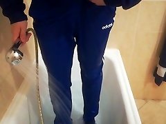 piss and shower in blue adidas clothes and shoes