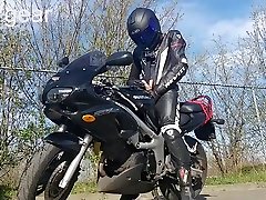 leather biker pisses over his sports bike, then cums over it