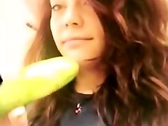 girl uses cucumber in restroom