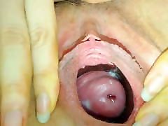 Woman showing her gaping pussy and cervix