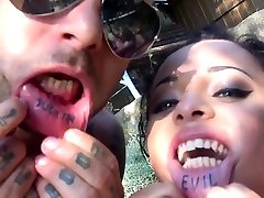 Flat chested girl makes guys double Blowjob closeup street...