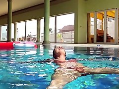 Kittina Ivory saian drink big peans boy swimming in the pool