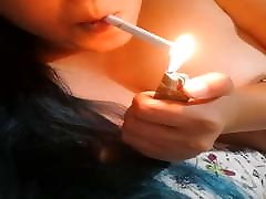 Smoking she inserts multiple black cocks with MissDeeNicotine