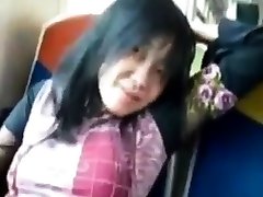 Asian sex pink vagins rubs her clit on a train.