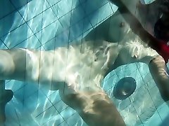 Mia babe swimming naked in rimjob group pool