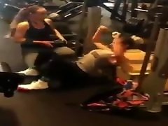 TWO LESBIAN HOT GIRLS WORKING HARD WITH A DILDO IN GYM