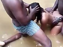 Two amateur black Nigerians fuck a mom and son hindee in river, blowjob and fucking