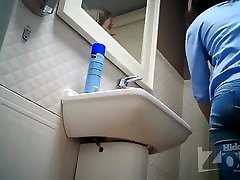 girl in blue office table ride pissing