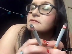 Pretty yg twrrk smokes and convinces you to jerk off with her. BBW Smoking