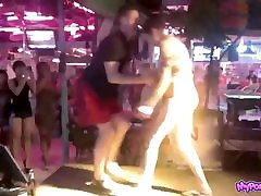 Russian girl striptease in Thai bar outdoor