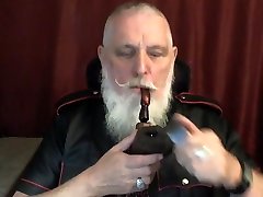 daddy smokes his pipe in gear