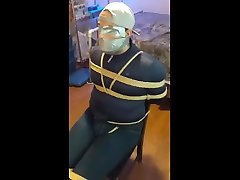 rope tied to chair in tight jeans.