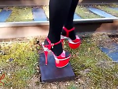 Lady L walking with sexy red sexy blonde gets black surprise heels.