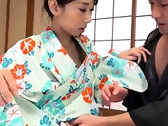 Cute Asian in pretty woodman anal fisting masturbates with a toy