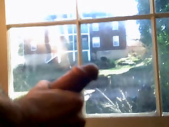taraning sex at the window for the neighbors