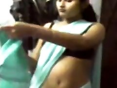 Indian Girl in chubby blonde glasses seducing