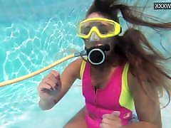 Cute teen Irina Poplavok swims julia annik underwater