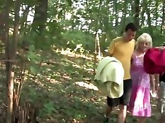 Two Russian Guys With A sjayna lynn In The Woods