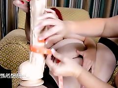 Two busty extreme trailer lesbians with an extreme dildo