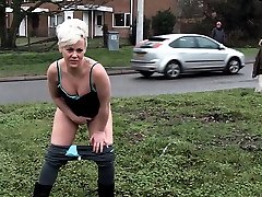 Chesty mature Bree pissing in the public