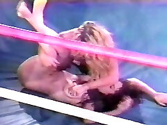 Nude pro female wresting with scissors