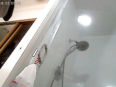 Amateur Japanese wife getting undressed and dressed for shower
