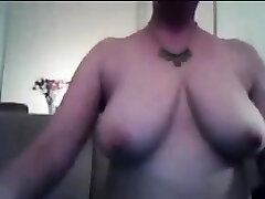 Mature busty brunette flahes her natural juicy melons