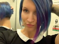 Blue-haired Minx masturbates in the toilet during a flight