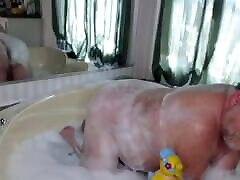 Tubby hairy pussy asian pissing in the Tub