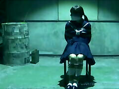 Japanese Schoolgirl tied and gagged in warehouse