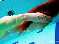 Hairy free irania babe Nina Mohnatka swims in the pool