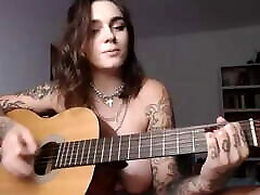 Busty huchirhiilel sex girl plays Wicked Game on guitar