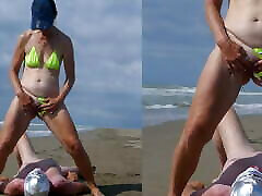 女人在海滩上撒尿
