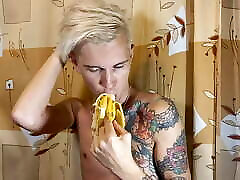 Sweet locksy winins eats a banana greedily