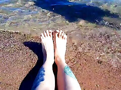 rara kaori Nika enjoys the salty sea on her feet.